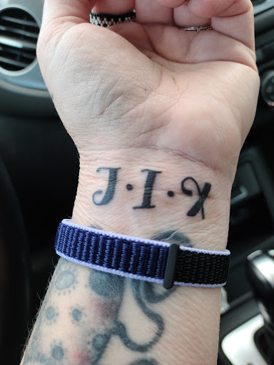 Explore flag tattoo ideas, creative tattoo ideas in Aurora, available at Aurora Tattoo Company