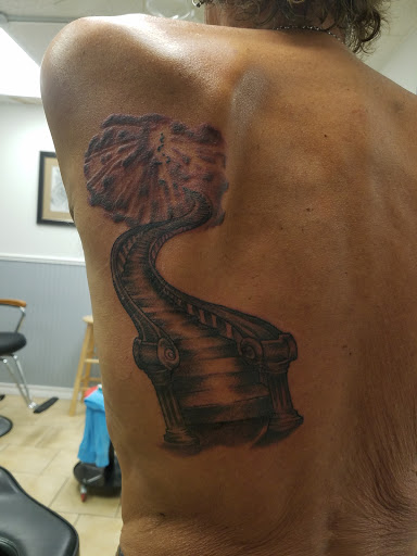 Tattoo Shop «magnum opus tattoo company», reviews and photos, 1817 Padre Blvd #4, South Padre Island, TX 78597, USA