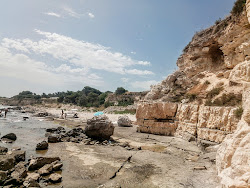 Foto von Le Conche Naturist Beach umgeben von Bergen