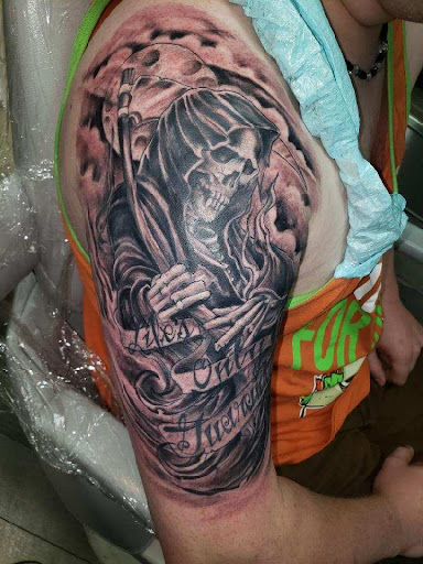 Explore mf doom tattoo ideas, creative tattoo ideas in Coeur D Alene, available at Inkworld Tattoo