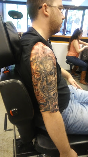 Explore female neck tattoo ideas, creative tattoo ideas in Seattle, available at Dzul Ink Lounge