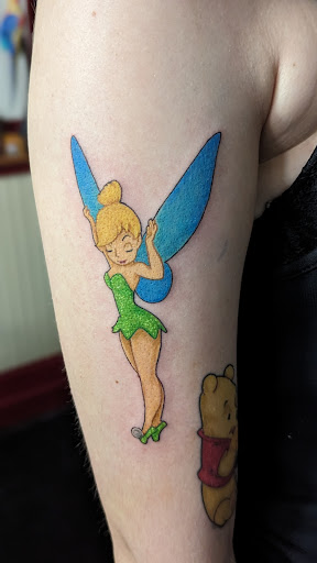 Explore rock music tattoo ideas, creative tattoo ideas in Georgetown, available at Grasshopper Tattoo Studio