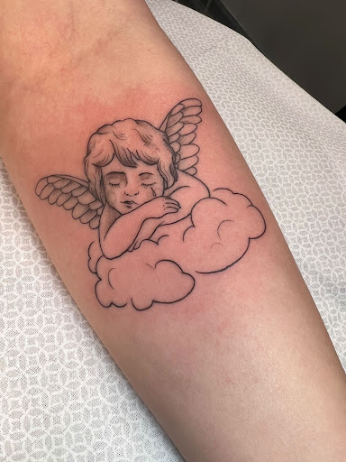 Explore dog print tattoo ideas, creative tattoo ideas in Goose Creek, available at Red Kirin Tattoo