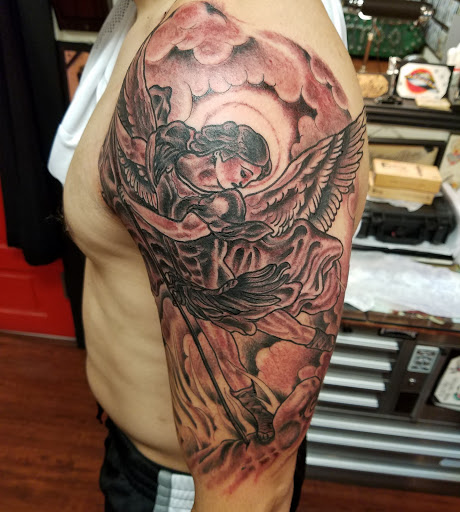 Find rib tattoo ideas for females for your next unique tattoo in Lakewood at Union Ave Tattoo Company