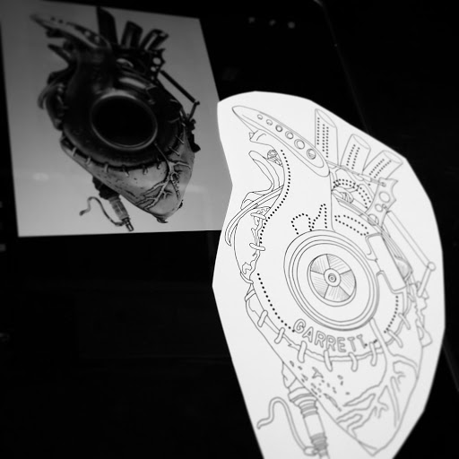 Find small tramp stamp tattoo ideas for your next unique tattoo in Leesburg at Trademark Body Art
