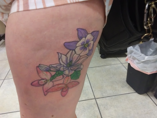 Explore fighting rooster tattoo ideas, creative tattoo ideas in Gulfport, available at Jack & Dianes Tattoo