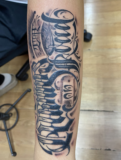 Explore lower leg tattoo ideas male, creative tattoo ideas in Jackson Heights, available at Jackie