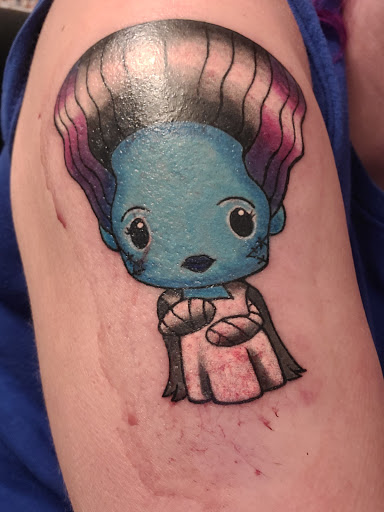 Explore portrait tattoo sleeve ideas, creative tattoo ideas in Black River, available at J.J.Ink