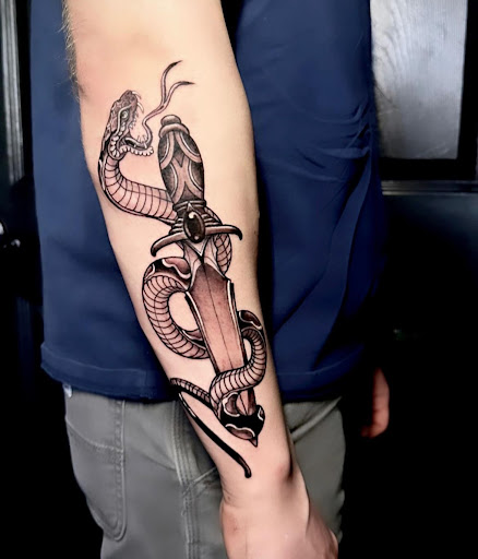 Explore gucci tattoo ideas, creative tattoo ideas in Spokane, available at Anchored Art Tattoo