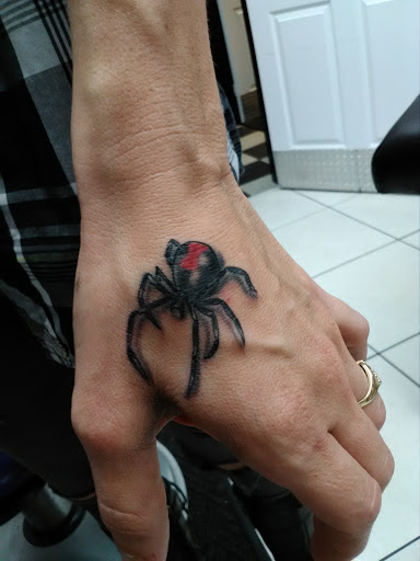 Tattoo Shop «Tropical Tattoo», reviews and photos, 825 S Yonge St, Ormond Beach, FL 32174, USA