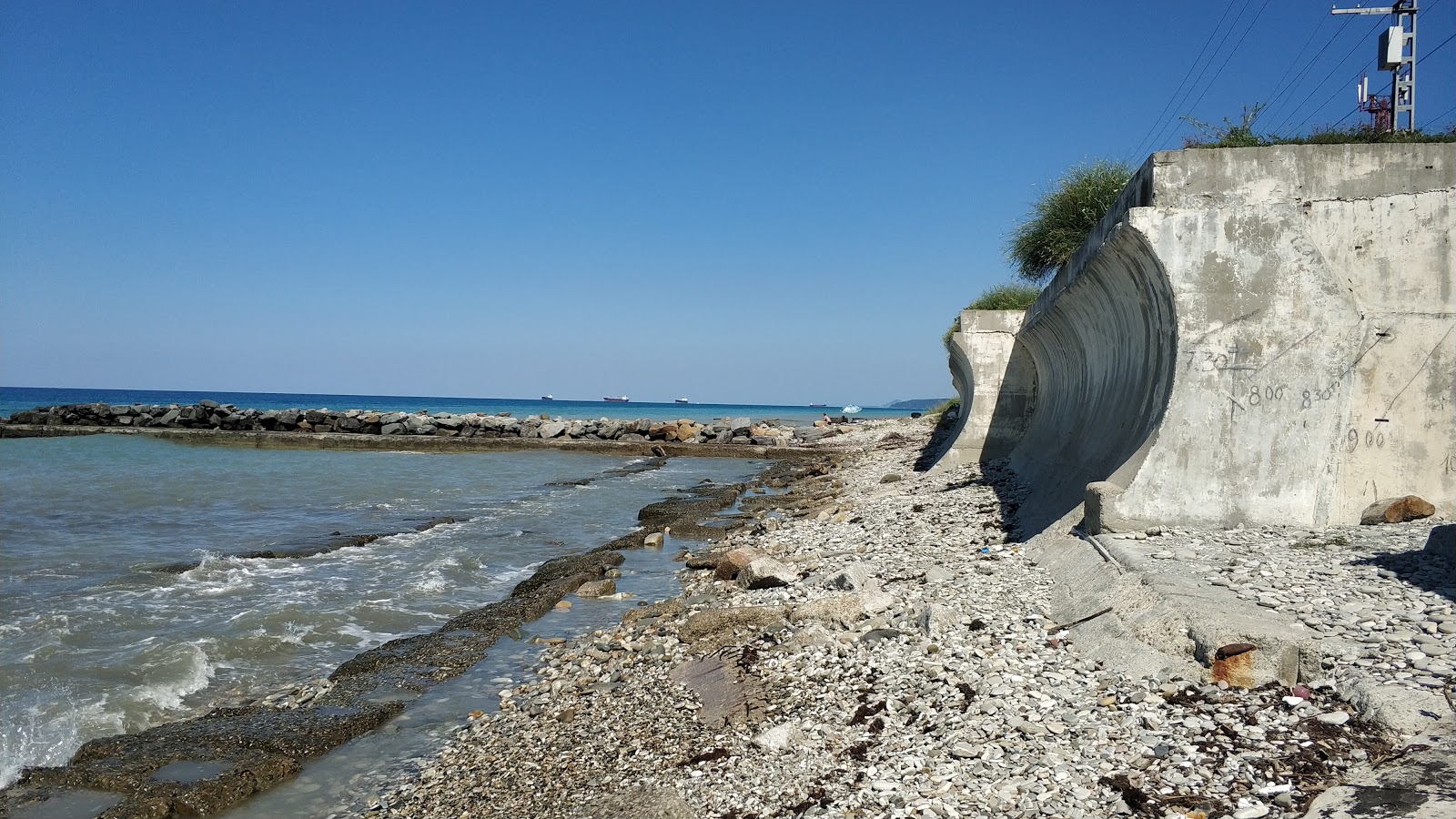 Foto av Magri beach och bosättningen