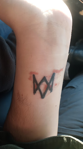 Explore memorial portrait tattoo ideas, creative tattoo ideas in San Marcos, available at Locally Famous Tattoo