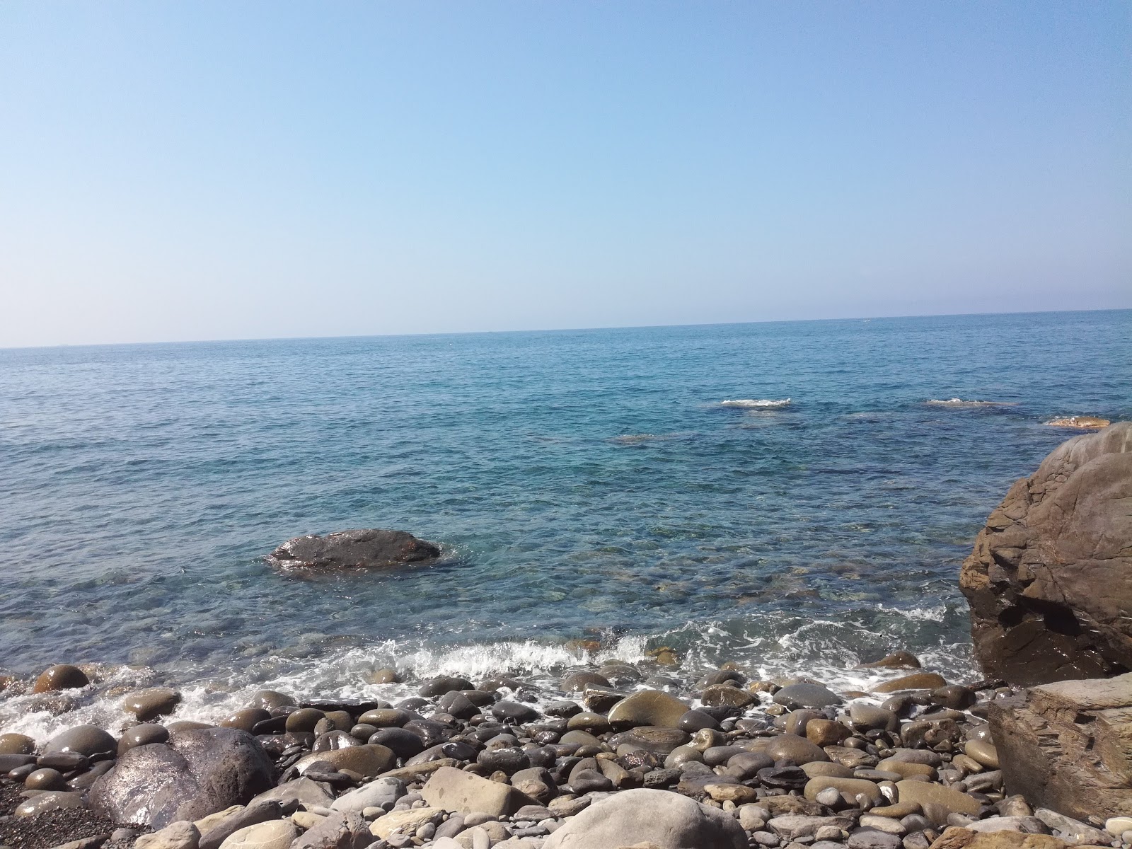 Fotografija Spiaggione di Corniglia z ravna obala