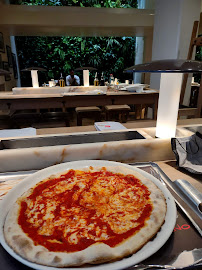 Pizza du Restaurant italien Vapiano Paris Champs Elysées Pasta Pizza Bar - n°19
