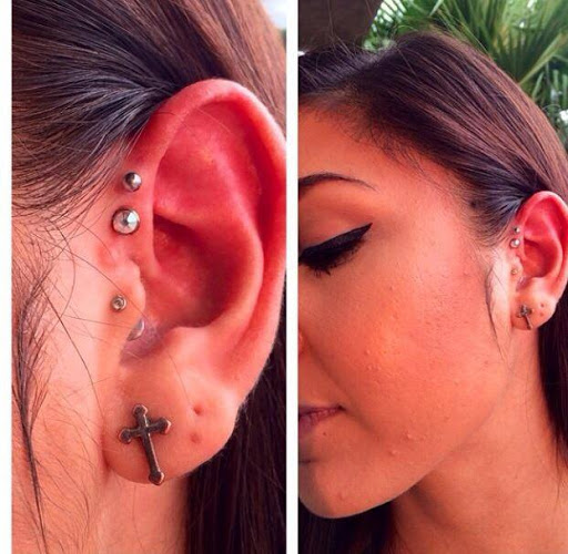 Explore back tattoo ideas for women, creative tattoo ideas in Corpus Christi, available at Prestigious Piercing