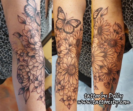 Explore small cross tattoo ideas, creative tattoo ideas in Lockport, available at Tattoo City by Larry Brogan