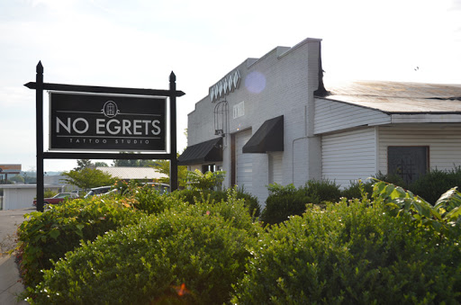 Explore tattoo cover up ideas on leg, creative tattoo ideas in Clarksville, available at No Egrets Tattoo Studio