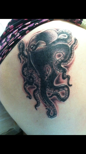 Explore back tattoo ideas for guys, creative tattoo ideas in Sacramento, available at 13 MAG TATTOO