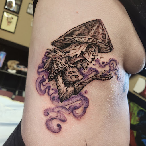 Explore side hand tattoo ideas, creative tattoo ideas in Augusta, available at Mr. Tattoo