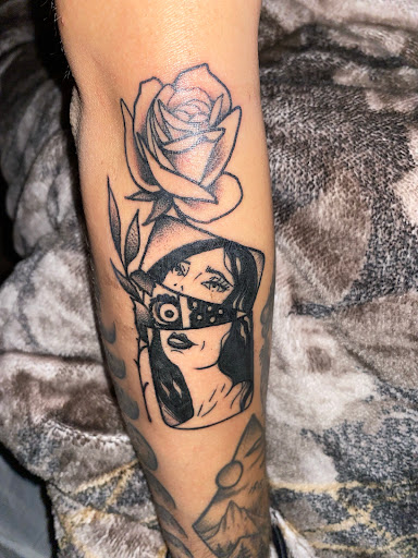 Explore pretty flower tattoo ideas, creative tattoo ideas in Reno, available at Evolution Tattoo