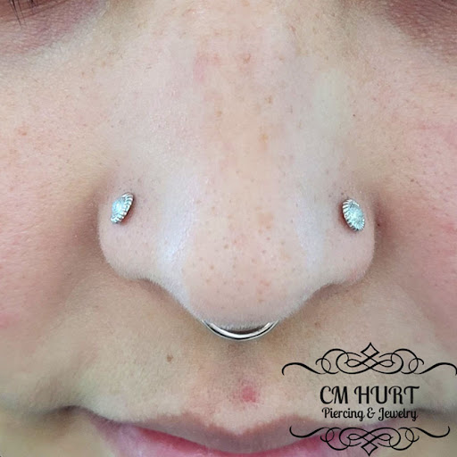 Explore large flower tattoo ideas, creative tattoo ideas in Garden Grove, available at CM Hurt Piercing & Jewelry