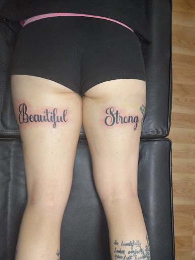 Explore street signs tattoo ideas, creative tattoo ideas in Kewanee, available at Splat Ink tattoos and piercings