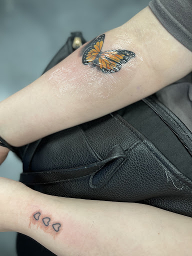 Explore pretty flower tattoo ideas, creative tattoo ideas in Crystal Lake, available at Monster Ink Tattoo & Piercing Studio