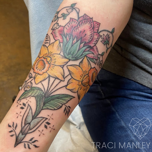 Explore daughter name tattoo ideas for dad, creative tattoo ideas in Spokane, available at Moms Custom Tattoo & Body Piercing