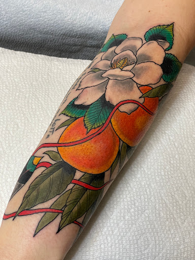 Explore bass guitar tattoo ideas, creative tattoo ideas in Naples, available at Webbworks Tattoo Studio