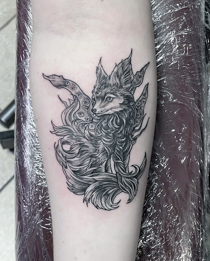 Explore girly tattoo ideas for a sleeve, creative tattoo ideas in Lawrence, available at Red 5 Tattoo