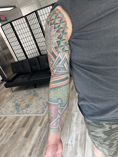 Explore mens patchwork tattoo ideas, creative tattoo ideas in Houston, available at Ella Tattoo