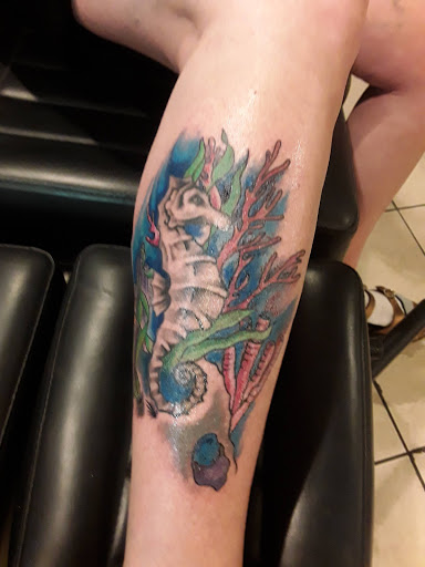 Explore sunflower arm tattoo ideas, creative tattoo ideas in Myrtle Beach, available at Pitbull Tattoo and Piercing Clinic