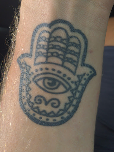 Tattoo Shop «Eye For An Eye Tattoo Parlor», reviews and photos, 1405 N Frazier St, Conroe, TX 77301, USA