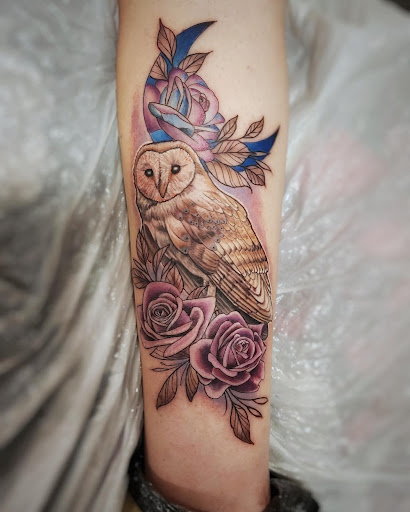 Explore cover up sleeve tattoo ideas, creative tattoo ideas in Hoschton, available at The Golden Mantis Tattoo & Piercing