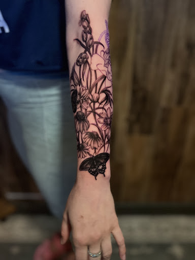 Explore tattoo ideas for females on hips, creative tattoo ideas in Hudson, available at The Bohemian Social Club