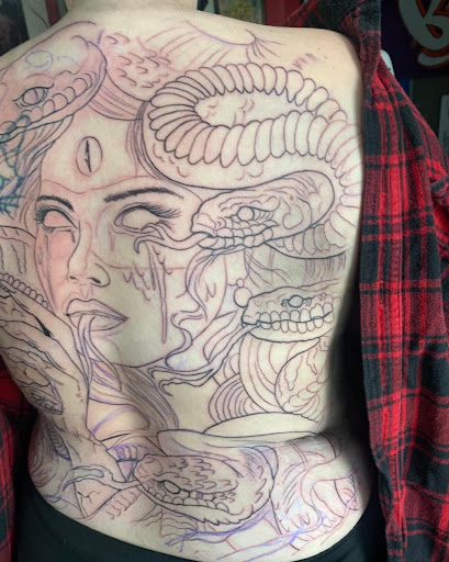 Explore trumpet tattoo ideas, creative tattoo ideas in Green Bay, available at Darkside Tattoo By Jesse Skywalker