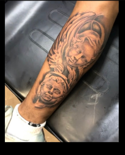 Explore wolf neck tattoo ideas, creative tattoo ideas in Clinton Township, available at Beyond the chair Tattoo studio Clinton Township