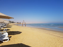 Stella di Mare Beach'in fotoğrafı düz ve uzun ile birlikte