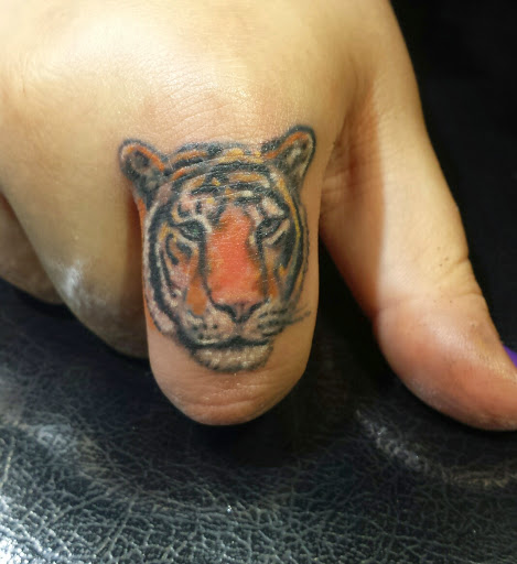 Explore bipolar tattoo ideas, creative tattoo ideas in East Northport, available at Tormented Souls