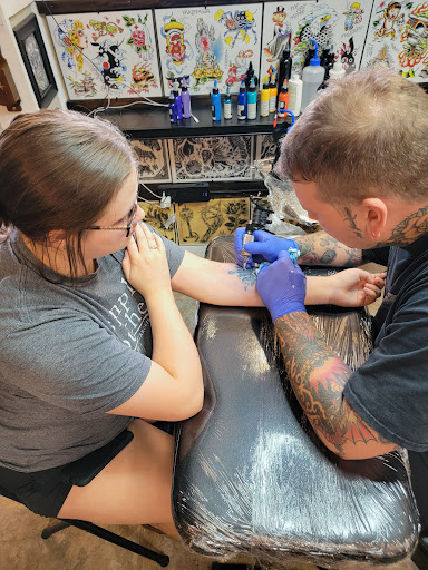 Explore loyalty over love tattoo ideas, creative tattoo ideas in North Charleston, available at Breakthrough Tattoo