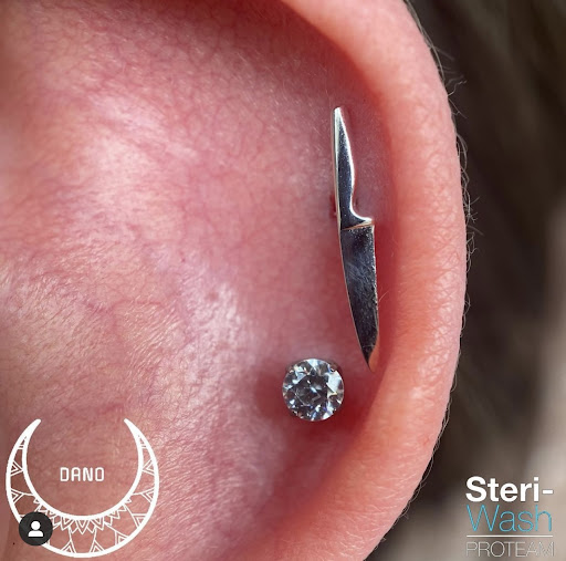 Explore fish tattoo ideas, creative tattoo ideas in Edison, available at Black Moon Piercing