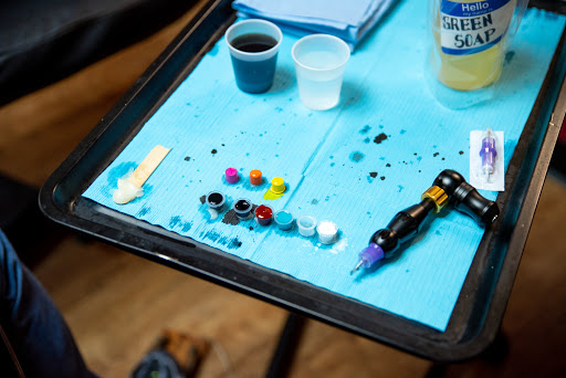 Explore mom death tattoo ideas, creative tattoo ideas in Akron, available at Knuckle Up Ink Tattoos