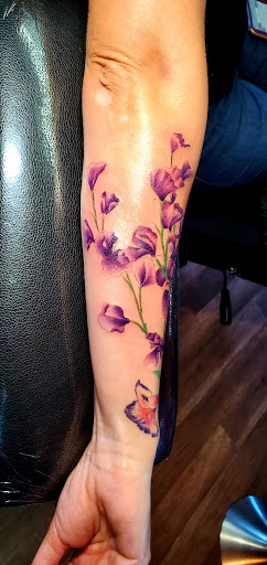 Explore mens rose tattoo ideas, creative tattoo ideas in Kalispell, available at Swindler Ink