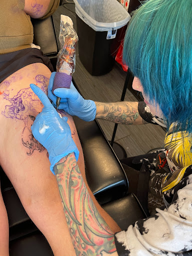 Explore black couple tattoo ideas, creative tattoo ideas in Palm Harbor, available at Angry Owl Tattoo and Piercing