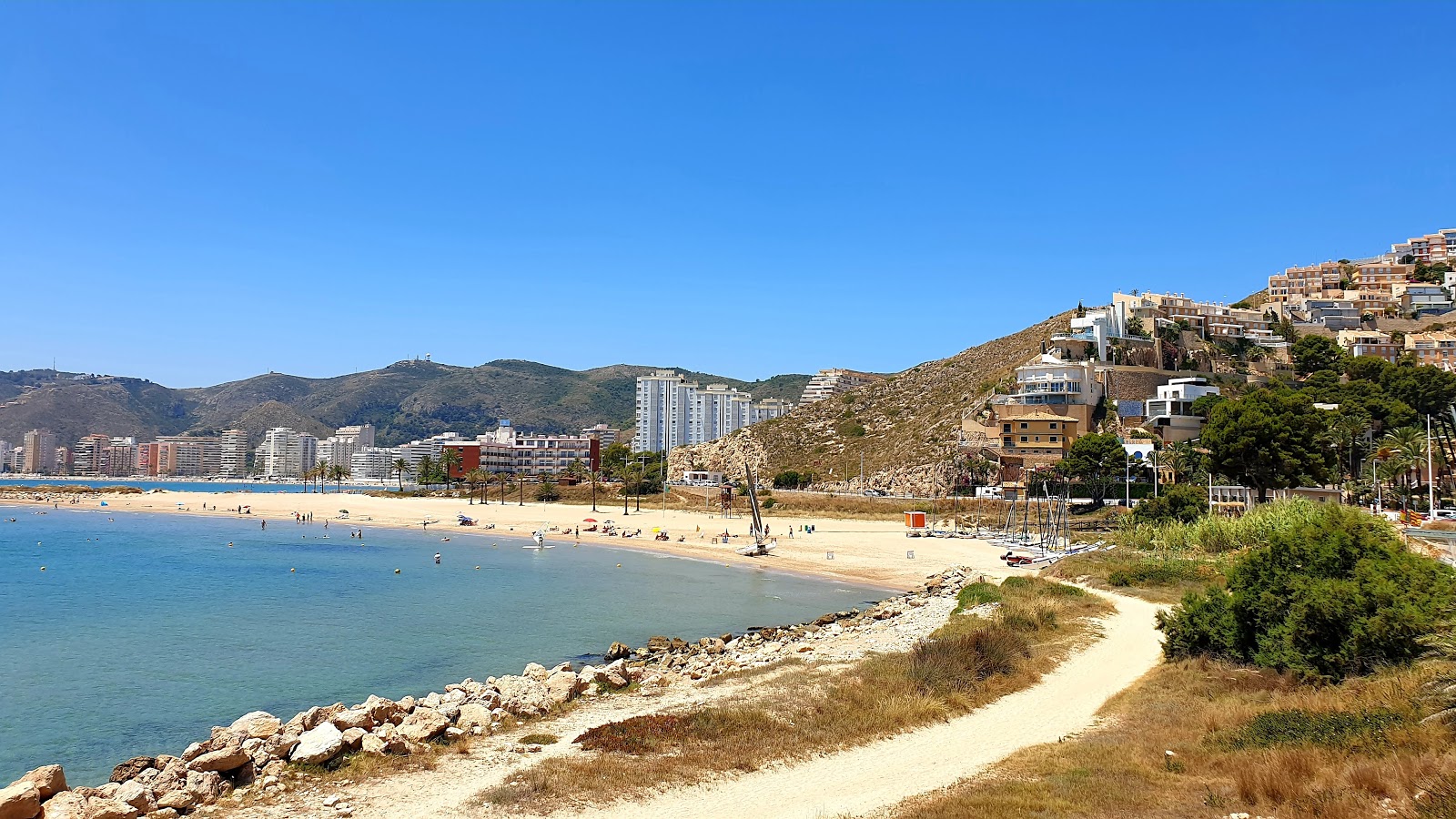 Foto de Cap Blanc Beach con arena beige superficie