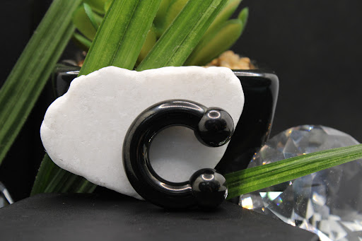 Explore men's behind the ear tattoo ideas, creative tattoo ideas in Milwaukee, available at Trust Tattoo and Body Piercings