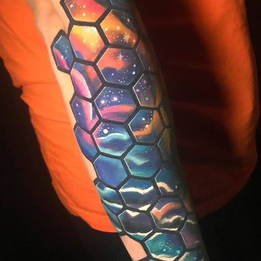 Find female rib tattoo ideas for your next unique tattoo in Millsboro at Tattoo Galaxy (Millsboro) Piercing & Custom tattoos