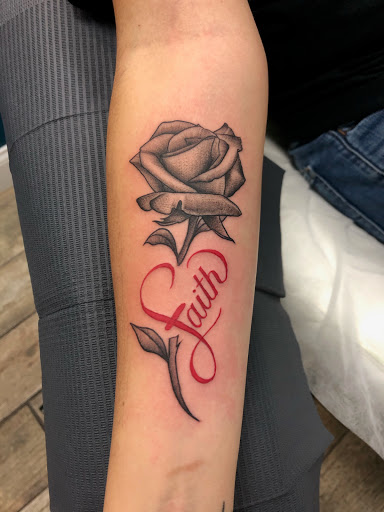 Explore tattoo ideas on ribs for guys, creative tattoo ideas in Buford, available at Wild Tribe Tattoos and Piercings