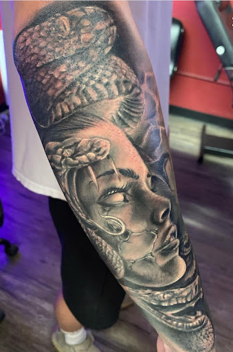 Explore kaws tattoo ideas, creative tattoo ideas in San Antonio, available at Its Live Through This Tattoos, Supplies, & Piercings