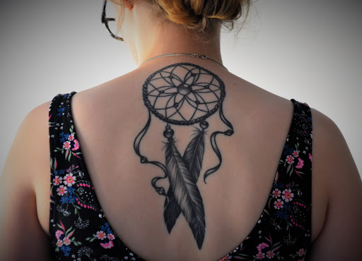 Explore womens neck tattoos ideas, creative tattoo ideas in Fort Worth, available at Twisted Ink